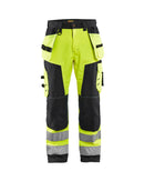 Highvis softshell riipputaskuhousut Huomio keltainen/Musta - Suomen Brodeeraus