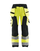 Naisten highvis riipputaskuhousut Huomio keltainen/Musta - Suomen Brodeeraus