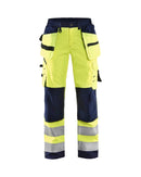 Naisten highvis softshell riipputaskuhousut Huomio keltainen/Mariininsininen - Suomen Brodeeraus