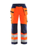 Naisten highvis softshell riipputaskuhousut Huomio oranssi/Mariininsininen - Suomen Brodeeraus